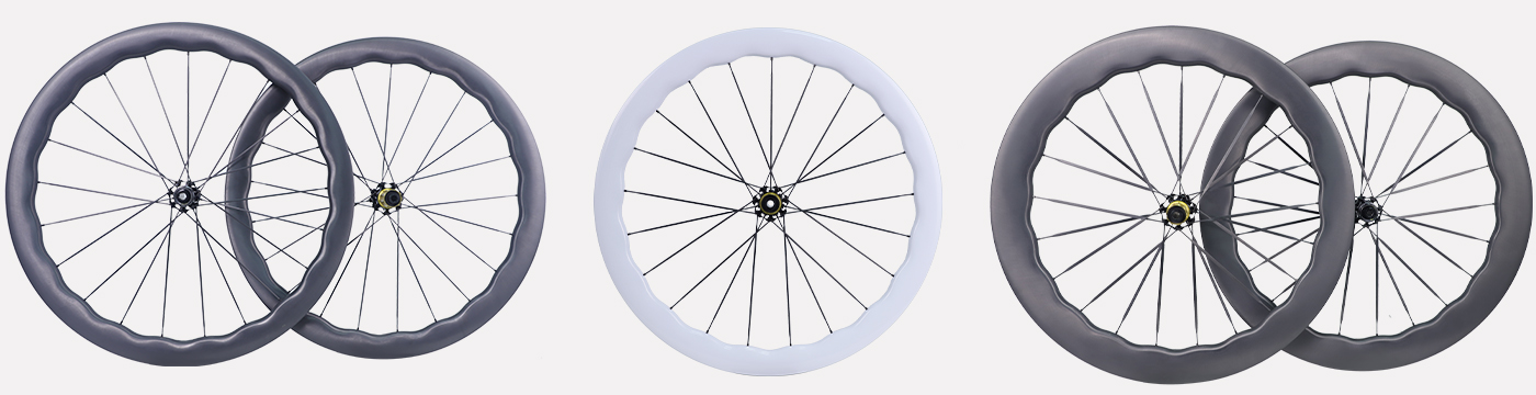 Non-paint carbon spoke road wheels and Pearl White wheels